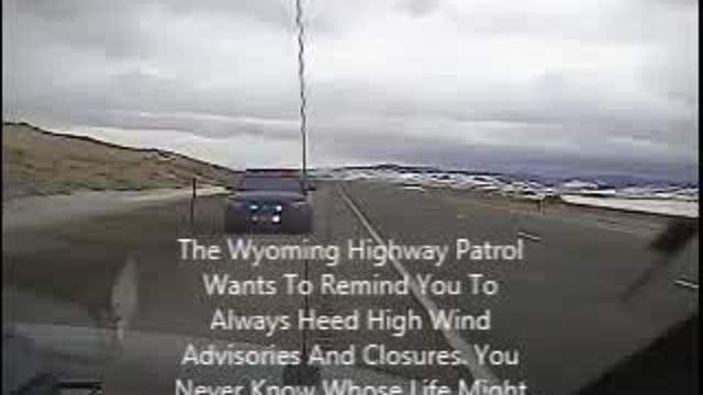 Wind gust blows truck on top of patrol car