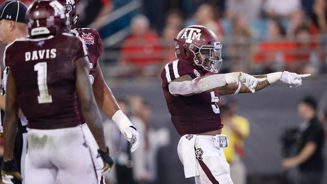 Texas A&M routs NC State 52-13 in Gator