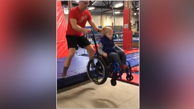 Video of happiest child in wheelchair on trampoline goes viral