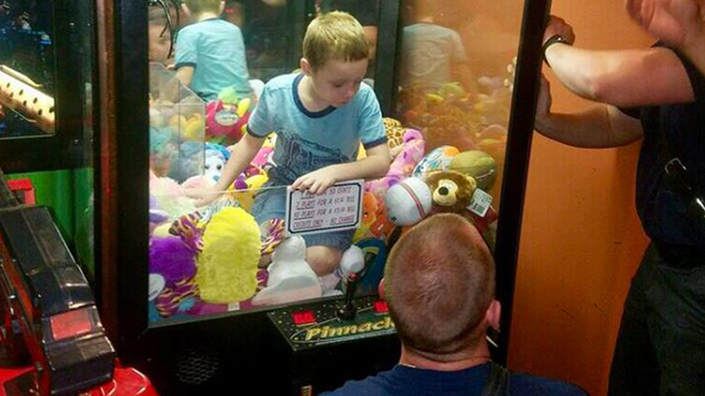 Boy gets stuck in restaurant's claw machine