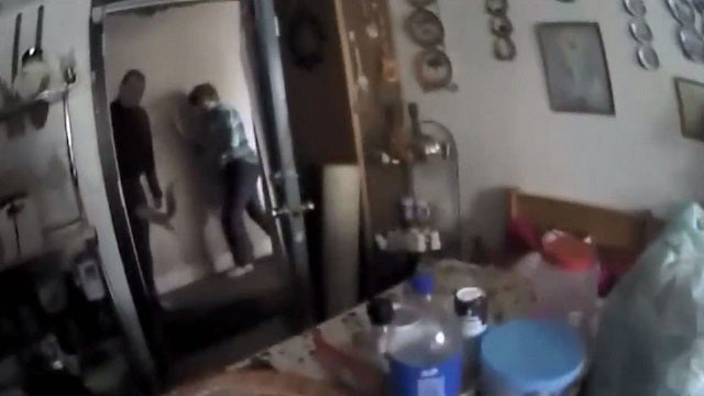 Body cam shows cookie-eating squirrel charging police