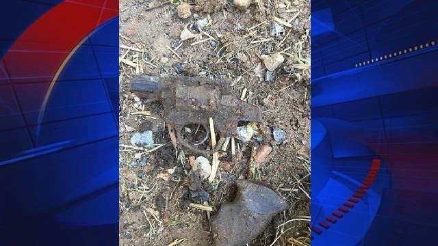 Charlotte woman stumbles upon gun while gardening