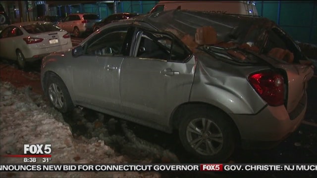Falling ice crushes parked car in Manhattan
