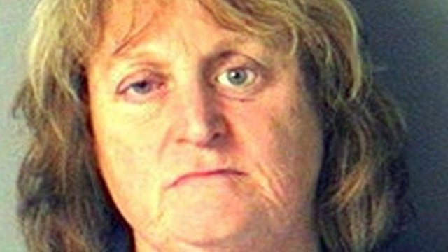 Woman arrested for pushing elderly Golden Retriever into lake to drown