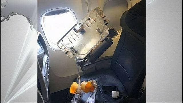 Falling oxygen canister hits 1-year-old in head on plane
