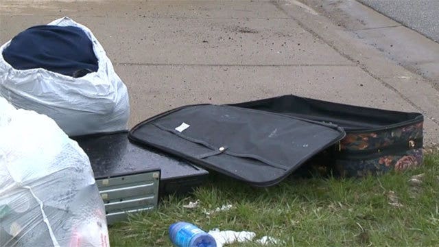 Mother who put children in suitcase charged with child abuse