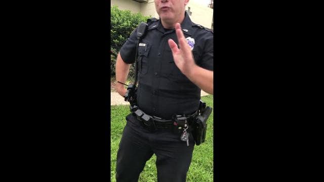 Police officer fines man, threatens him with jail over jaywalking