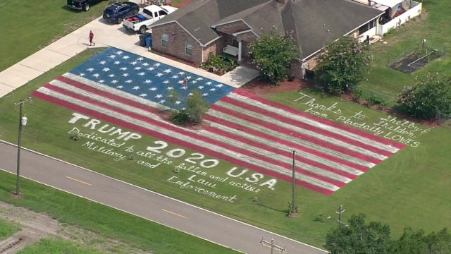 Giant flag painted on home's lawn in Plant City
