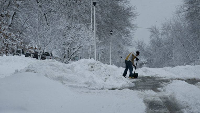 86331862-snow shoveling-404023.jpg