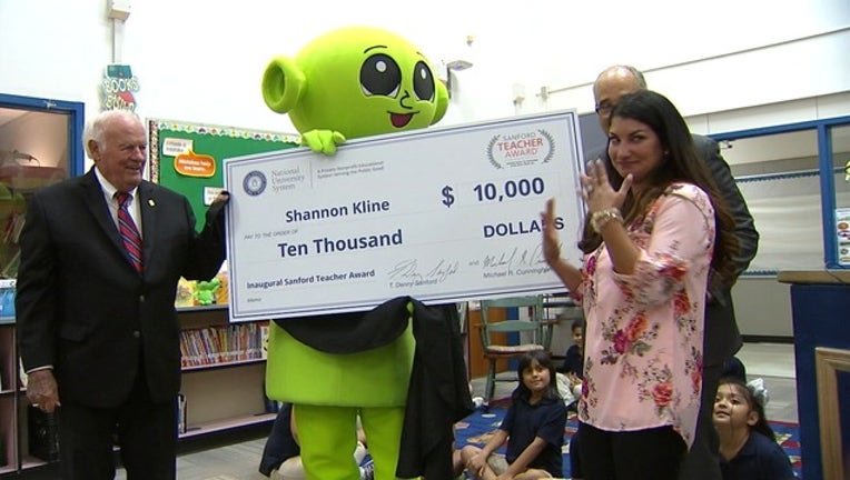 6P 190 TZ- DISD TEACHER SURPRISED WITH AWARD 6P_00.00.16.21_1538064781975.png-409650.jpg