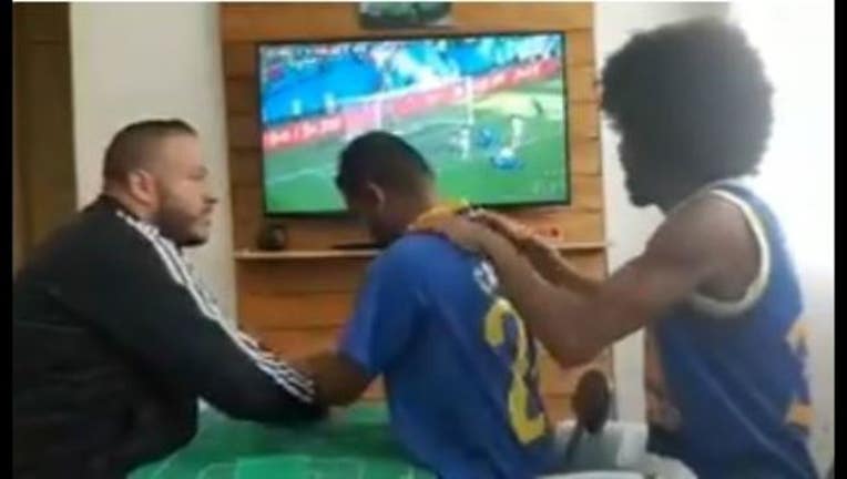 Watch how these friends help deaf-blind Brazil fan experience World Cup goal-65880
