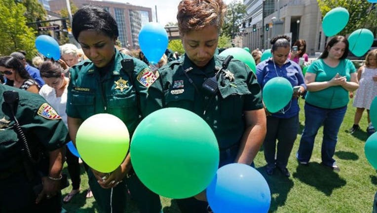 1525bea3-Baton-Rouge-officers_1469129738647.jpg