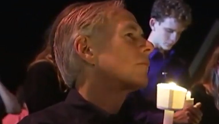 77b8c189-CandlevigilAbbott_1509987132143.jpg