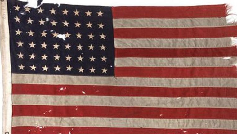 daacf5f9-D-Day-flag_1465774123069.jpg