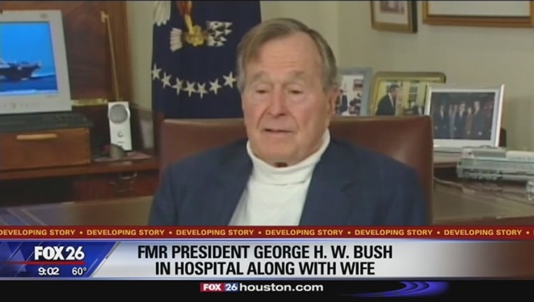 5fa2a62c-Former_president_George_H_W__Bush_and_wi_0_20170119031420-408795