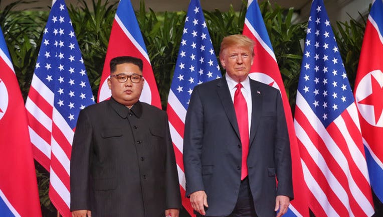 GETTY---Kim-Jong-Un-Donald_1528802026120.jpg