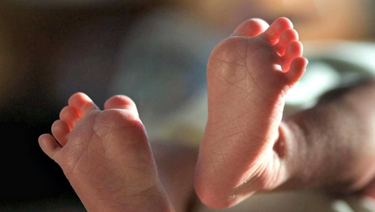 67c307dd-GETTY baby feet generic_1558400350366.jpg-404023.jpg