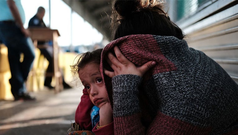 efe04fc9-GETTY migrant children_1530128711189.jpg.jpg