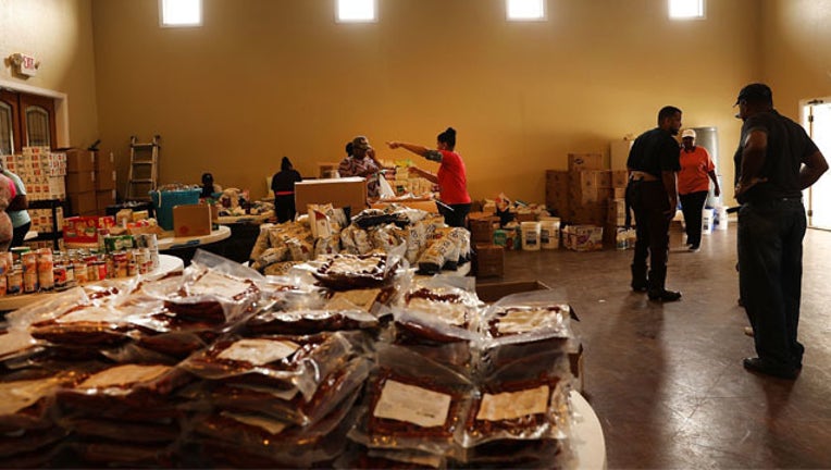 GETTY_Harveydonation_1505417549690.jpg