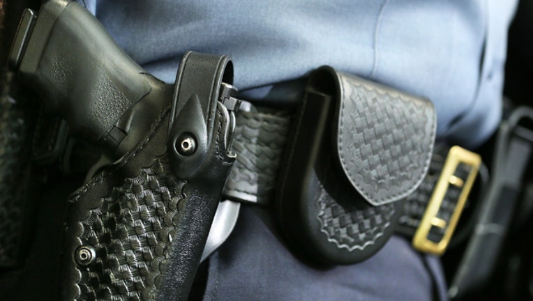 63c54a96-GETTY_gun and holster_1525726876409.jpg.jpg