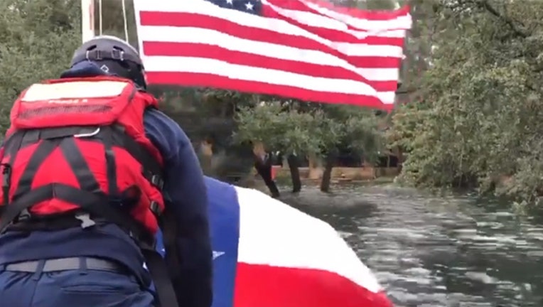 KTBC flag recue flood 10182018_1539895747852.jpg.jpg