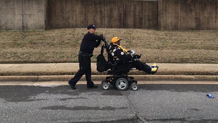 MEMPHIS PD_wheelchair and officer_010619_1546791839874.png-402429.jpg