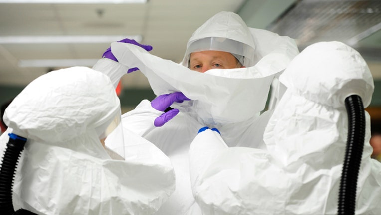20fda222-Medical support team trains on how to use personal protection devices when working in Ebola-contaminated areas_1541891700754.jpg-404023.jpg