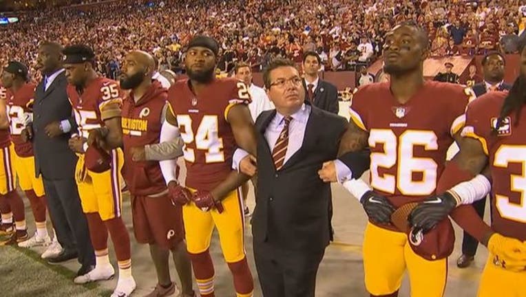 Redskins Anthem Players Lock Arms Daniel Snyder-401720.jpg