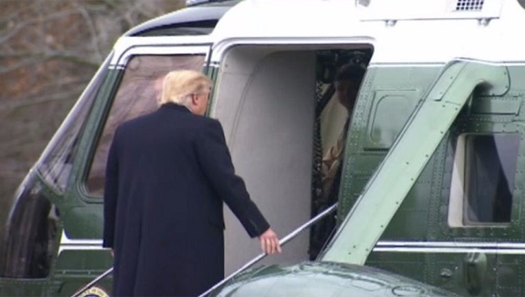 b0c1f432-Trump Getting on Marine 1_1485984179661-401096.jpg