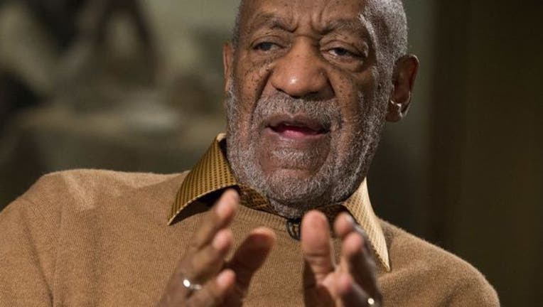 fbed24ae-bill cosby hand gesture ap_1444925767255.jpg