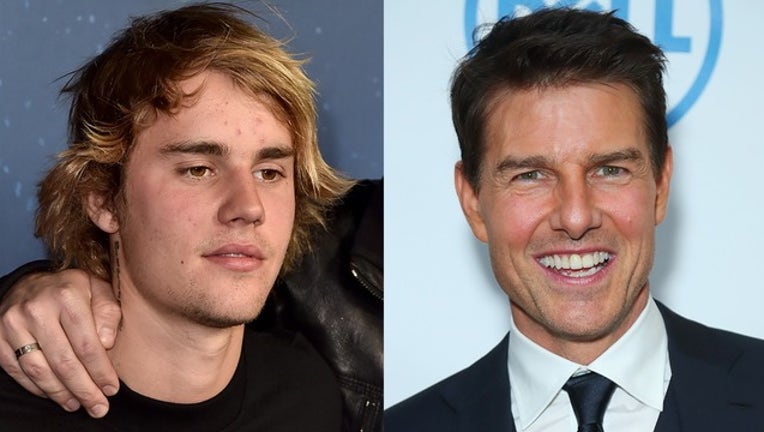 279535b9-getty_tom cruise justin bieber_061019_1560185772717.png-402429.jpg