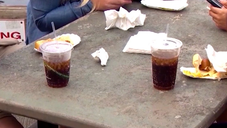 plastic-cups-straws_1529551355145-402429.jpg