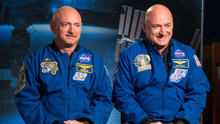 79616a20-scott and mark kelly_1521108243907.jpg-401385.jpg