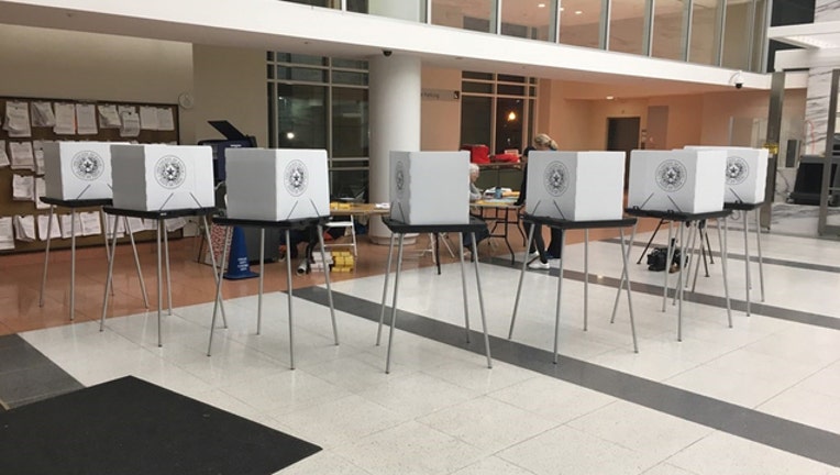 10ff18ec-voting booths_1520342790101.jpg-409650.jpg