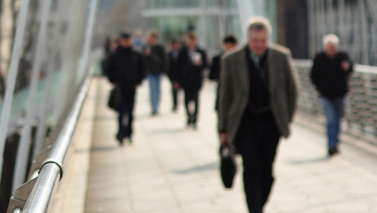 fdf875e4-walking to work  file photo_1454329900114-401385.jpg