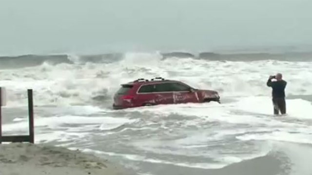 Driver abandons Jeep in waves after getting stuck on SC beach during Hurricane Dorian