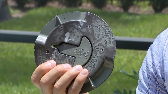 Airplane part drops from sky into swimming pool