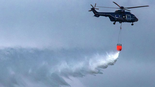 Catholic bishop to rain down ‘holy water' from helicopter in ‘mass exorcism' over city