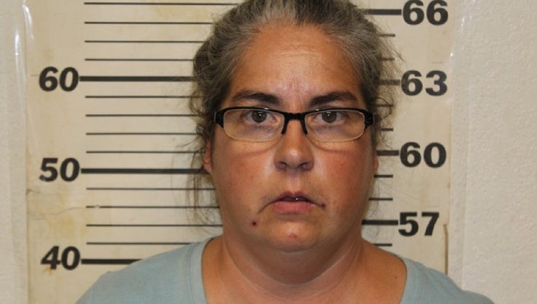 Tiffany Woodington, 49, was charged with 10 counts of felony animal abuse and two misdemeanor counts of animal abuse.