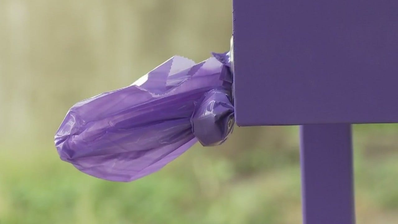 What's up with those violet trash bags appearing around Austin?