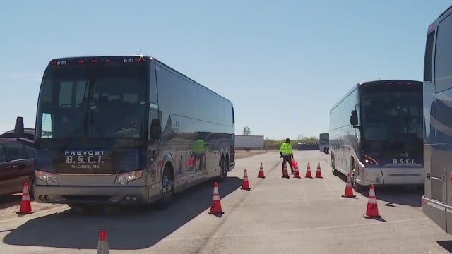 APD inspecting shuttle buses prior to F1 weekend