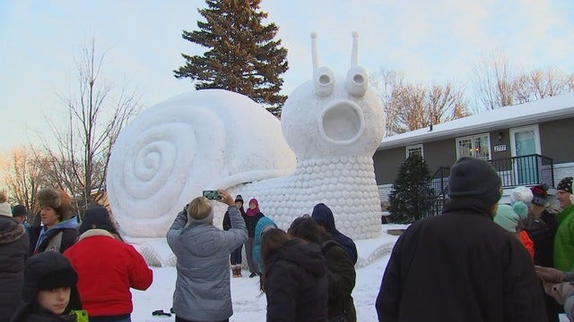 Minnesota brothers create 23-foot tall snail snow sculpture