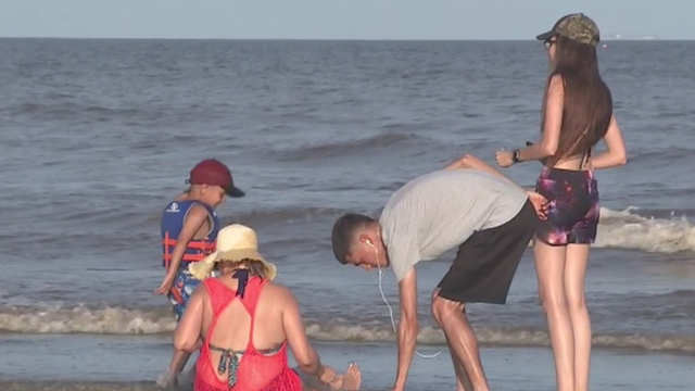 Storm threat not keeping tourists away from Galveston