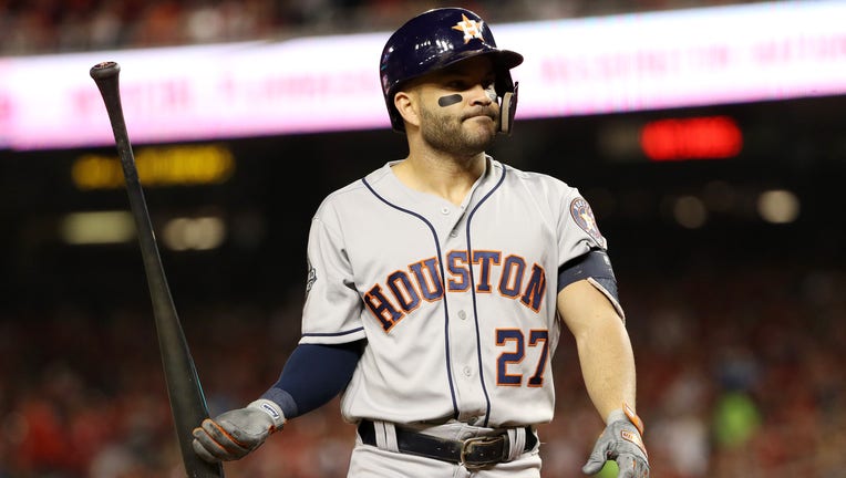WASHINGTON, DC - OCTOBER 25: Jose Altuve #27 of the Houston Astros reacts against the Washington Nationals during the fifth inning in Game Three of the 2019 World Series at Nationals Park on October 25, 2019 in Washington, DC. (Photo by Patrick Smith/Getty Images)
