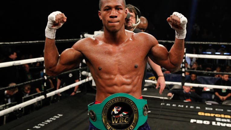 BROOKLYN, NY - MARCH 03: Patrick Day (blue/silver) defeated Kyrone Davis (white/gold) ON MARCH 3, 2018, at the Barclays Center in Brooklyn, NY. (Photo by Edward Diller/Icon Sportswire via Getty Images)