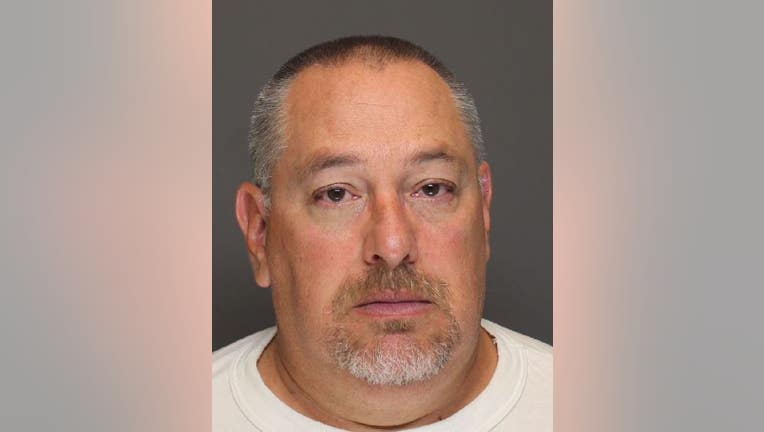 3b0db971-Randy Beehler, 53, is charged with third and fourth degree criminal sexual conduct for allegedly sexually assaulting an inmate he was transporting.