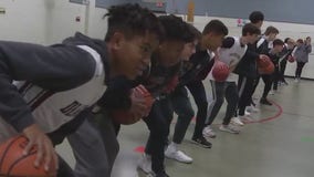 Class Act: Round Rock HS basketball team mentoring Bluebonnet Elementary students