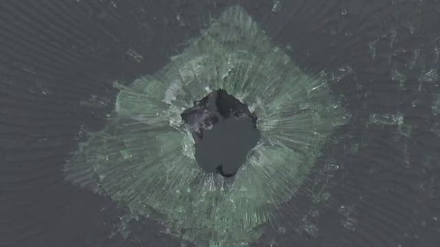 South Austin pawn shop shootout puts bullet holes in family's car