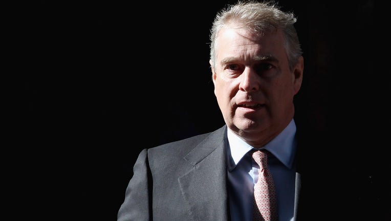FILE - Prince Andrew, Duke of York leaves the headquarters of Crossrail at Canary Wharf on March 7, 2011 in London, England.