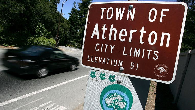 ATHERTON, CA - JULY 12: A car passes by the Town of Atherton city limits sign July 12, 2005 in Atherton, California. According to a recent survey by Forbes.com, Atherton, a small town in the heart of silicon has been called the most expensive ZIP Code, 94027, in the nation, with a median home price of nearly $2.5 million in 2004 and has been attracting several Google employees who are taking advantage of hot company stock options. (Photo by Justin Sullivan/Getty Images)
